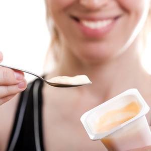 patient eating yogurt as part of her post-op diet