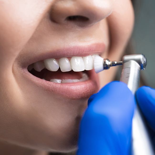 Patient receiving fluoride treatment