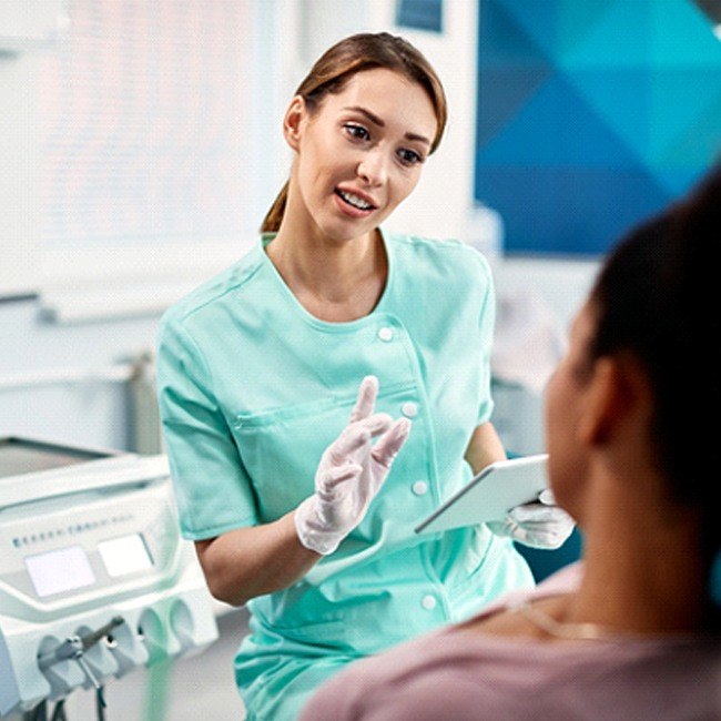 Dentist discussing eligibility in Van Nuys