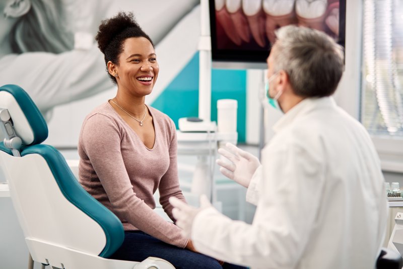 A patient learning how to find the best implant dentist